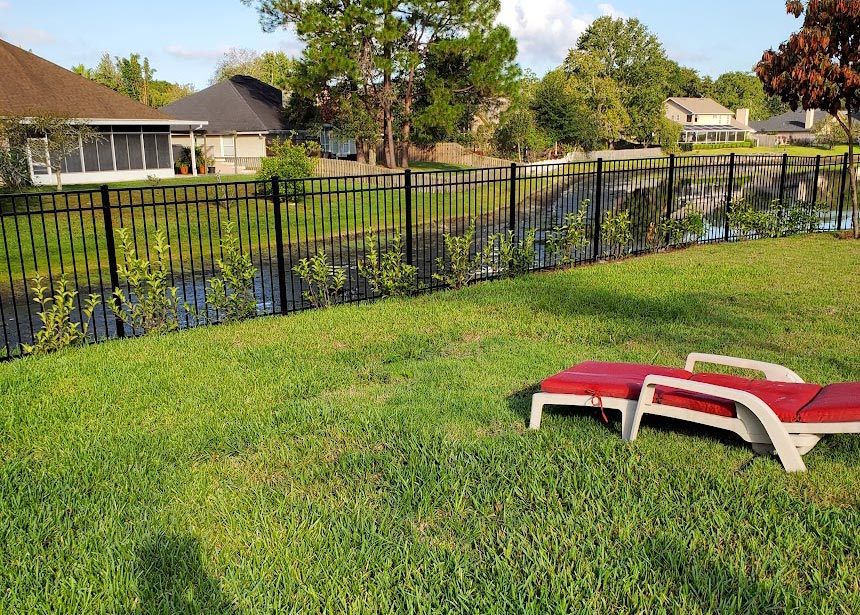 Aluminum Fence Along Water Length