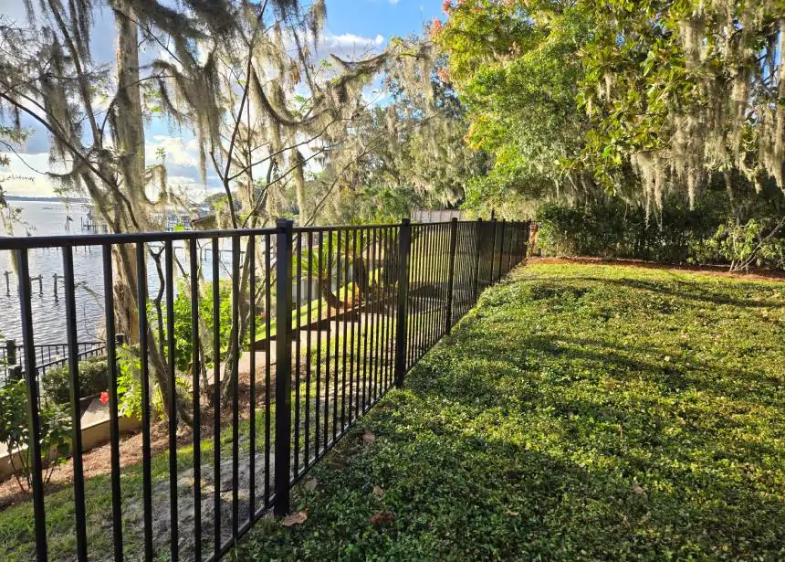 Black aluminum fence installed at Jacksonville home