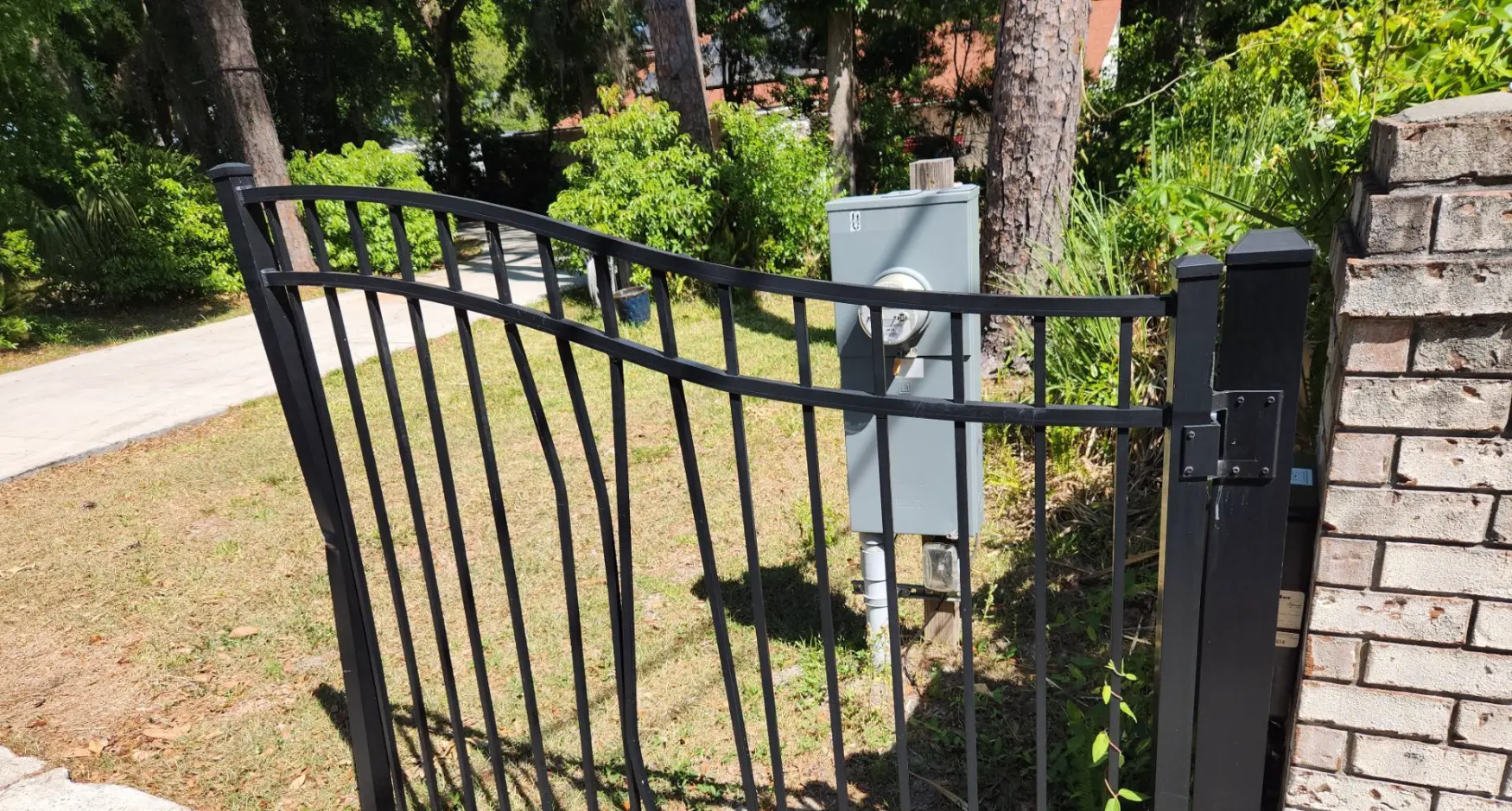 Damaged Metal Driveway Gate