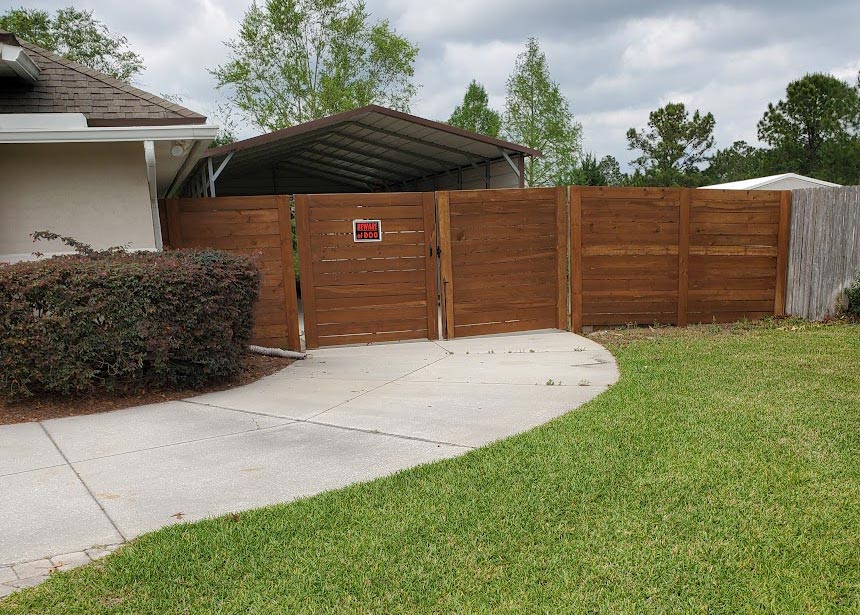 Double Wooden Gate With Stain