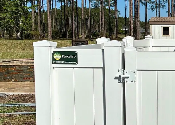 Fencepro Badge On A White Pvs Vinyl Fence In Jacksonville