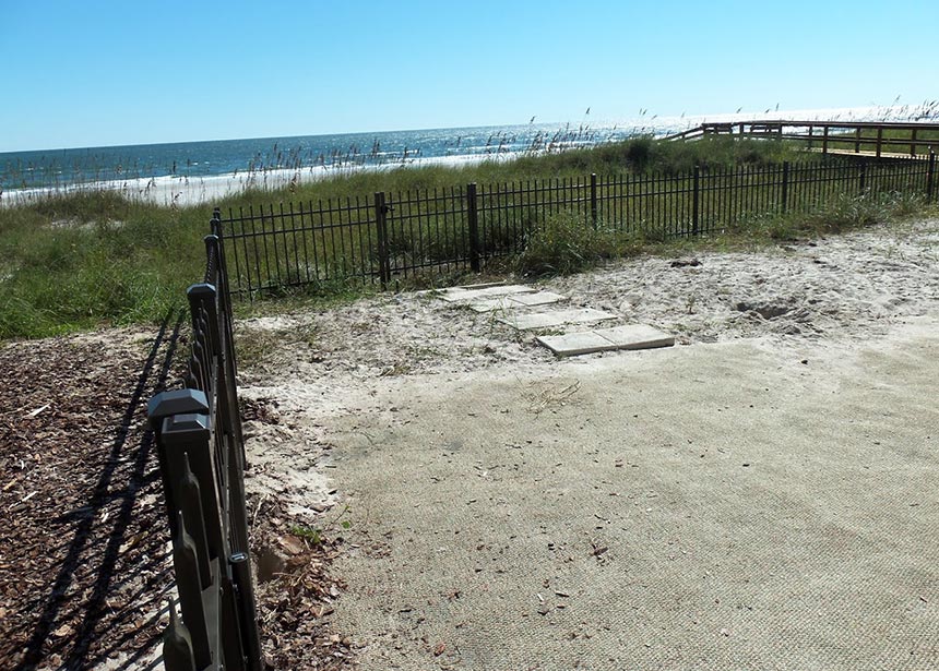 Metal Fence Along The Beach Corner