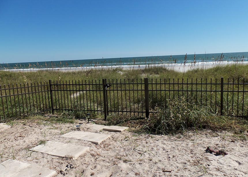 Metal Fence Along The Beach Small Gate