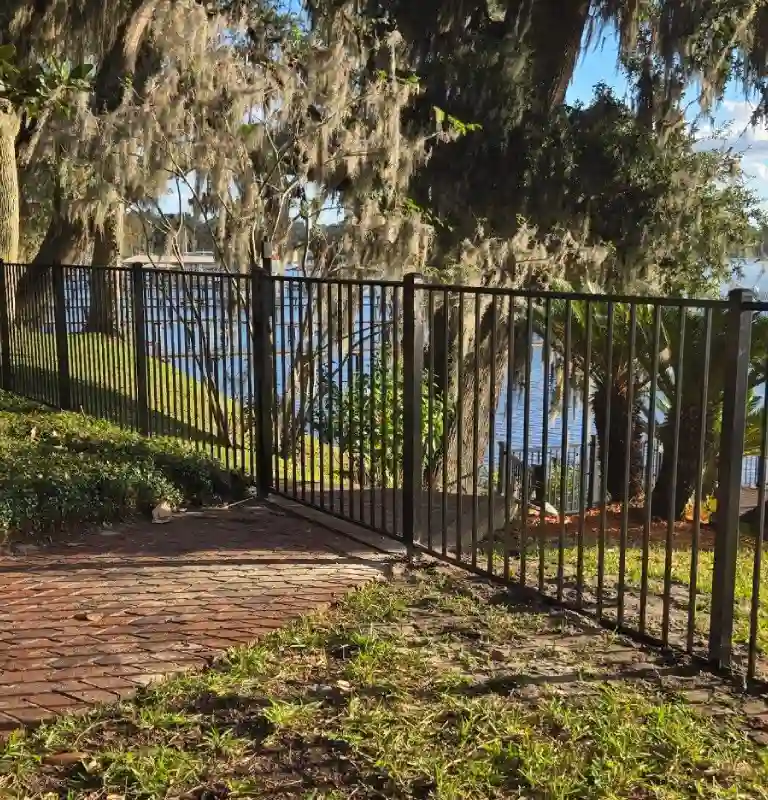 Riverfront Metal Fence In Jacksonville Portrait