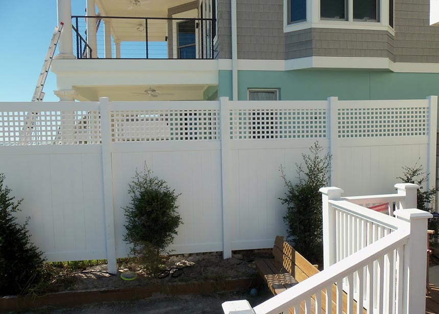 Tall Privacy Fence At The Beach Zoomed In