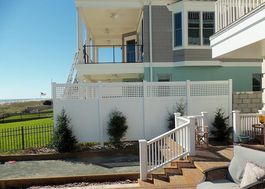 Tall Privacy Fence At The Beach Zoomed Out