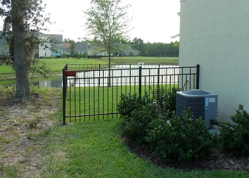 Three Rail Aluminum Fencing Connected To House