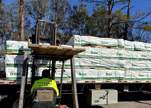 Unloading Tractor Trailer Of Fence To Be Installed In Jacksonville