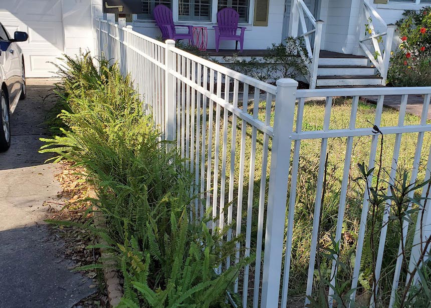 White Metal Fence Corner